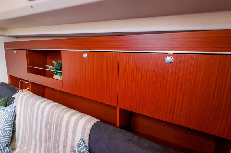 Slide: The Image of Wooden cabinetry in a 2016 Hanse 385 yacht interior, featuring sleek design and modern decor. - 39