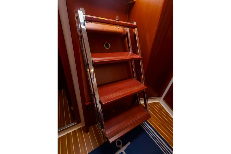 Slide: The Image of Wooden steps with chrome rails inside a 2016 Hanse 385 yacht. - 43