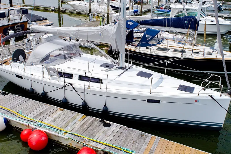 Slide: The Image of 2016 Hanse 385 sailboat docked at marina, featuring sleek design and modern amenities. - 64