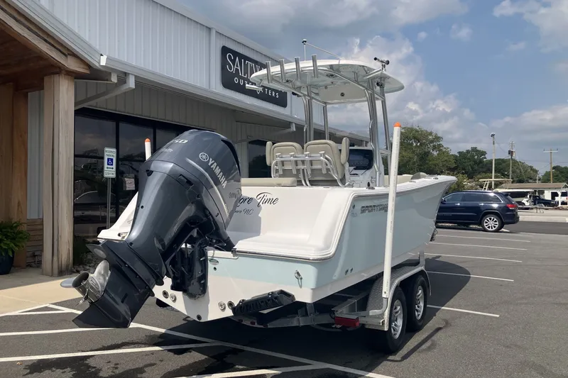 Slide: The Image of 2023 Sportsman Open 232 Center Console boat with Yamaha engine on trailer. - 7