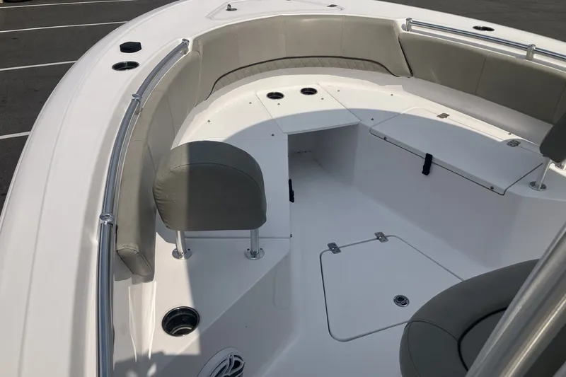 Slide: The Image of 2023 Sportsman Open 232 Center Console boat interior with seating and storage compartments. - 15