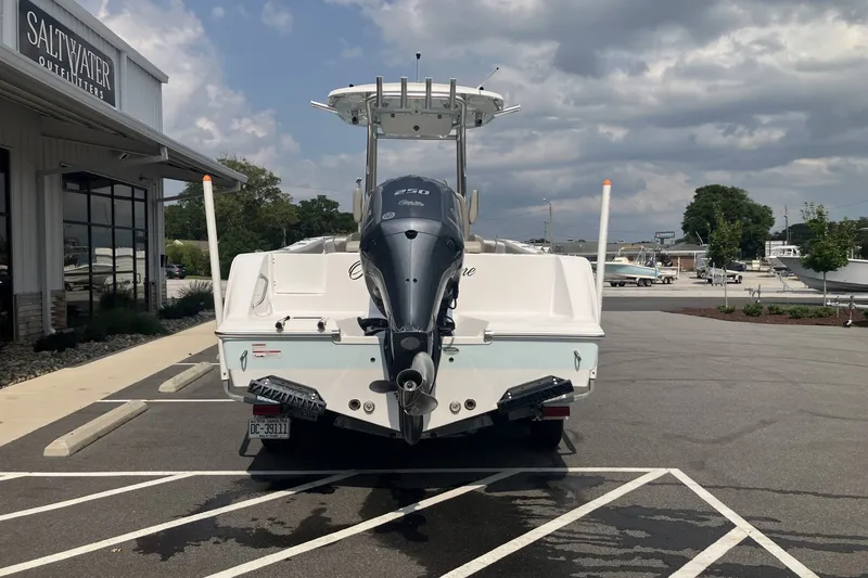 Slide: The Image of 2023 Sportsman Open 232 Center Console boat parked at Saltwater Outfitters. - 8