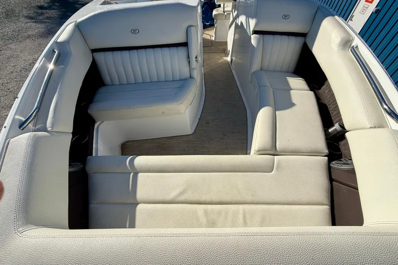 Slide: The Image of 2018 Cobalt R35 boat interior with white leather seating and spacious layout. - 22