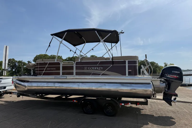 Slide: The Image of 2021 Godfrey Sweetwater 2286 FS pontoon boat with Yamaha outboard motor on trailer. - 50
