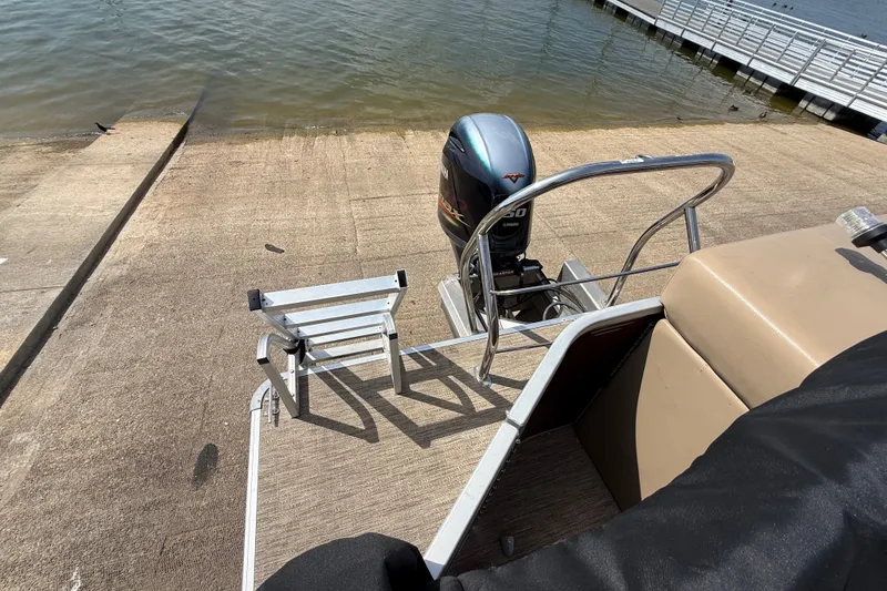 Slide: The Image of 2021 Godfrey Sweetwater 2286 FS boat at dock with Yamaha outboard motor. - 45