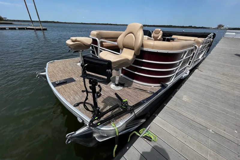 Slide: The Image of 2021 Godfrey Sweetwater 2286 FS pontoon boat docked on a sunny day. - 76