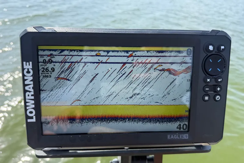 Slide: The Image of Lowrance fish finder display on 2021 Godfrey Sweetwater 2286 FS boat, showing underwater details. - 58
