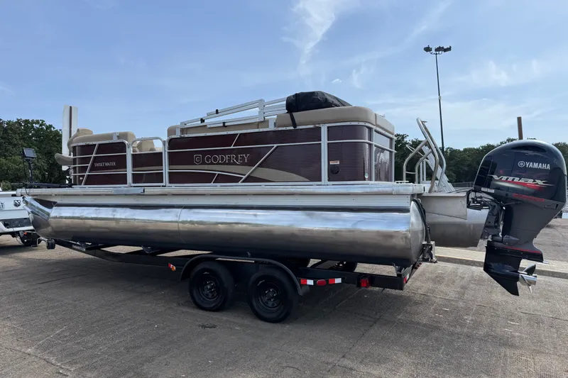 Slide: The Image of 2021 Godfrey Sweetwater 2286 FS pontoon boat with Yamaha outboard motor on trailer. - 23