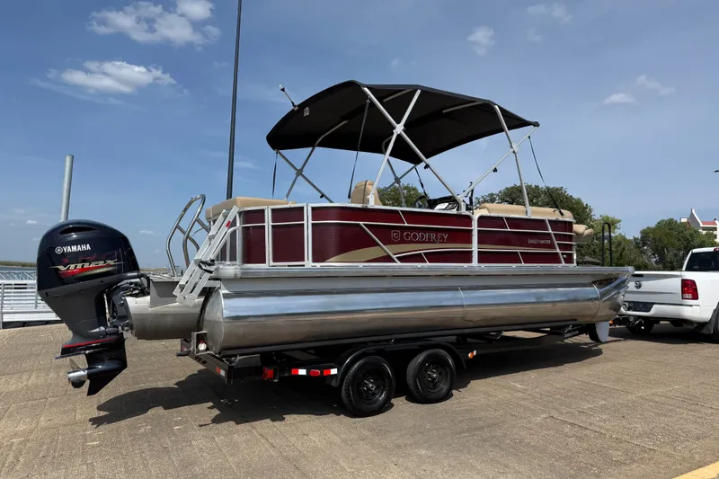 Slide: The Image of 2021 Godfrey Sweetwater 2286 FS pontoon boat on trailer with Yamaha outboard motor. - 47