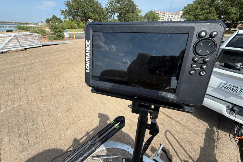 Slide: The Image of Lowrance Eagle 9 fishfinder on a 2021 Godfrey Sweetwater 2286 FS boat, dockside view. - 31