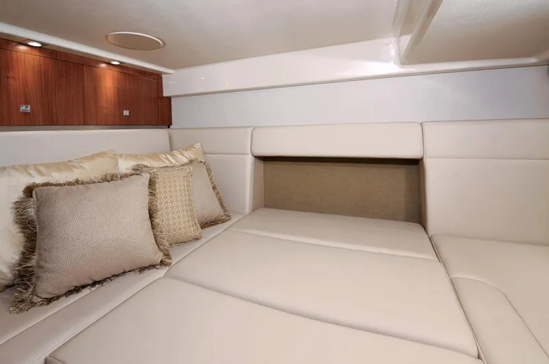 Slide: The Image of Manufacturer Provided Image: Luxurious interior cabin of 2013 Chaparral 330 Signature yacht with plush bedding. - 30