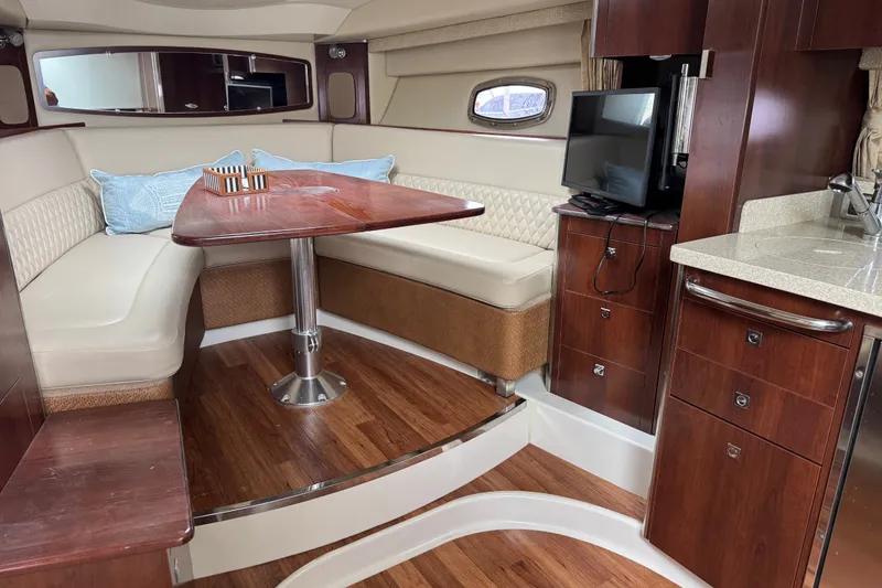 Slide: The Image of Luxurious interior of 2013 Chaparral 330 Signature yacht with elegant seating and modern amenities. - 11