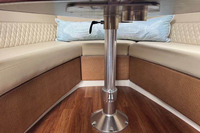 Slide: The Image of Interior seating area of 2013 Chaparral 330 Signature boat with elegant upholstery. - 12