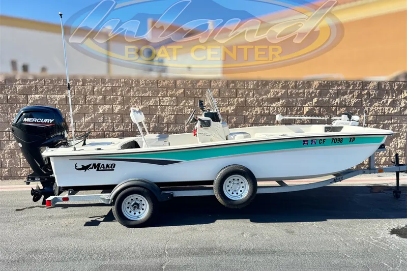 The Image of 2023 Mako Pro Skiff 17 CC boat with Mercury engine on trailer at Inland Boat Center. - 0