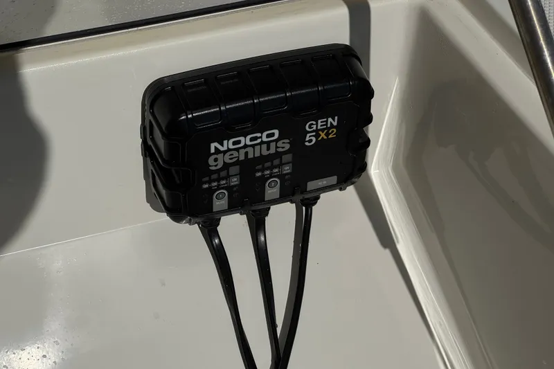 Slide: The Image of NOCO Genius GEN 5X2 charger installed on 2023 Mako Pro Skiff 17 CC boat. - 15