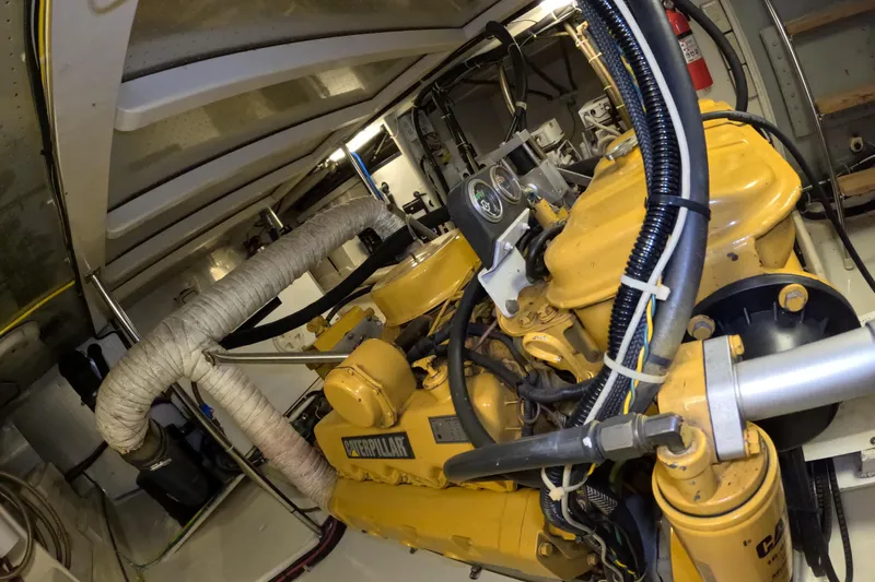 Slide: The Image of Engine room of 1999 Kadey-Krogen 48 North Sea yacht with Caterpillar engine. - 93