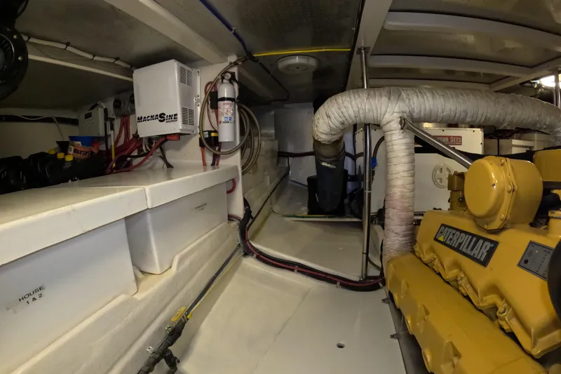 Slide: The Image of Engine room of a 1999 Kadey-Krogen 48 North Sea yacht with Caterpillar engine. - 79
