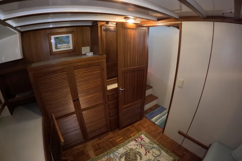 Slide: The Image of Interior of 1999 Kadey-Krogen 48 North Sea yacht with wooden cabinetry and nautical decor. - 41