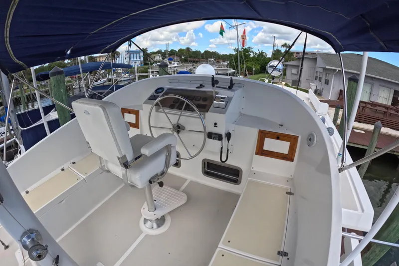 Slide: The Image of Helm of 1999 Kadey-Krogen 48 North Sea yacht with steering wheel and controls. - 67