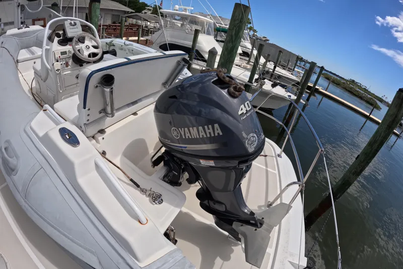 Slide: The Image of Kadey-Krogen 48 North Sea yacht with Yamaha 40 outboard motor at marina, 1999 model. - 75