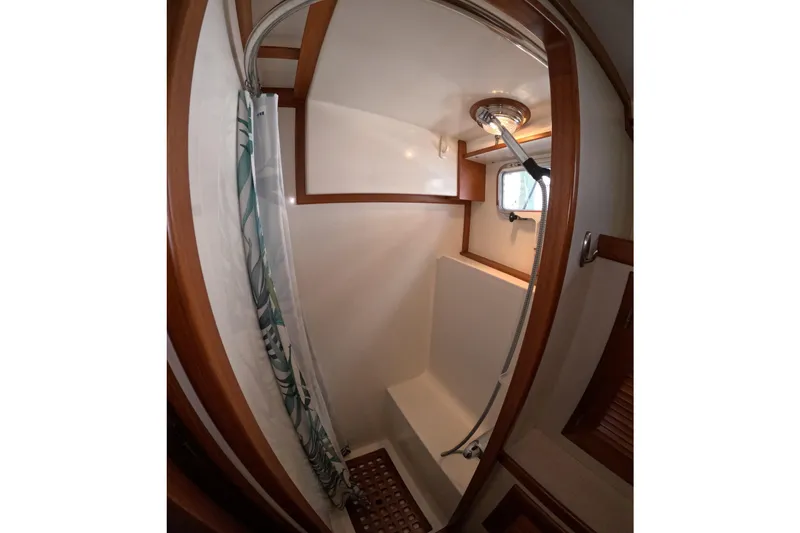 Slide: The Image of Shower area in 1999 Kadey-Krogen 48 North Sea yacht with wooden accents. - 44
