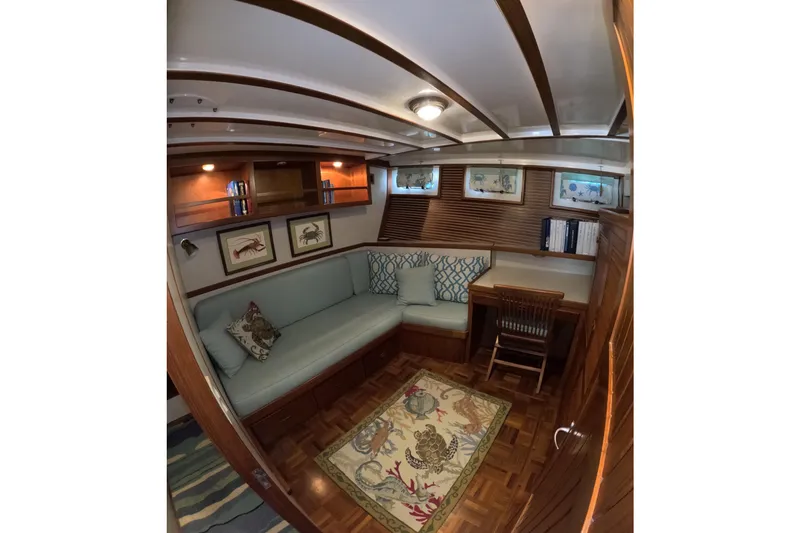 Slide: The Image of Cozy interior of 1999 Kadey-Krogen 48 North Sea yacht with elegant woodwork and nautical decor. - 38