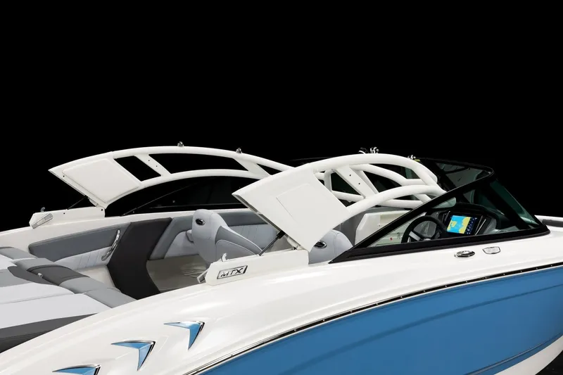 Slide: The Image of 2027 Chaparral 21 SSi boat interior with modern dashboard and seating. - 13