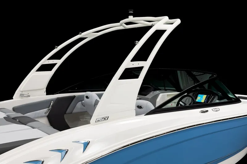 Slide: The Image of 2027 Chaparral 21 SSi boat with sleek design and modern dashboard features. - 12