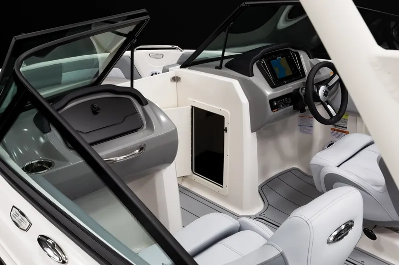 Slide: The Image of Interior of 2027 Chaparral 21 SSi boat with modern dashboard and seating. - 10