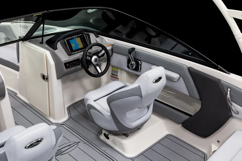 Slide: The Image of Interior of 2027 Chaparral 21 SSi boat with modern dashboard and steering wheel. - 9