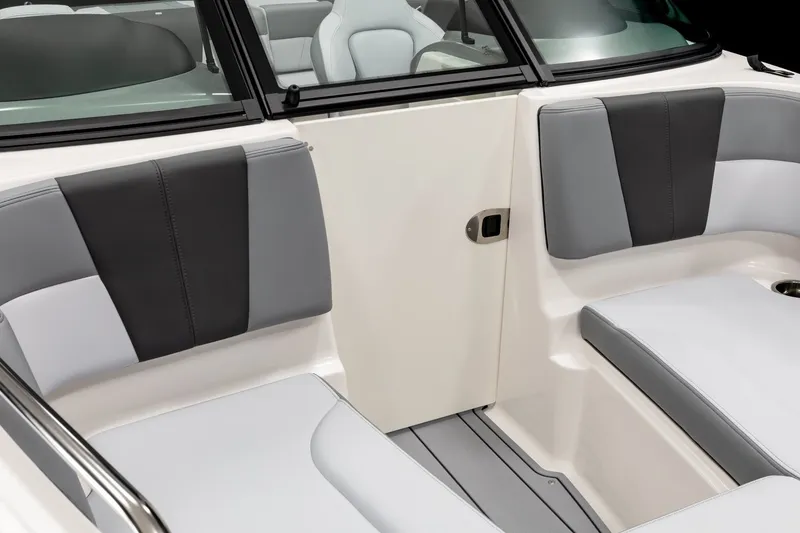 The Image of Interior seating of 2027 Chaparral 21 SSi boat, featuring sleek gray and black upholstery. - 1