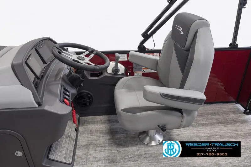 Slide: The Image of Captain's seat and helm of 2027 Bennington 168 SLJ pontoon boat, featuring modern controls. - 3