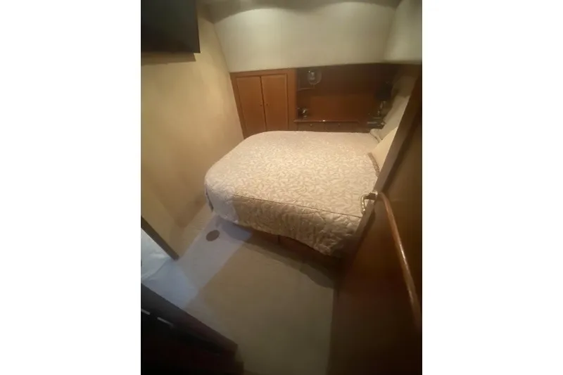 Slide: The Image of Luxurious bedroom interior of 2005 Ocean Yacht 50' Super Sport. - 14