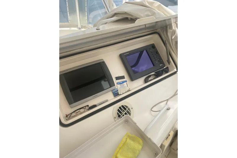 Slide: The Image of Control panel of a 2005 Ocean Yacht 50' Super Sport with navigation equipment. - 24