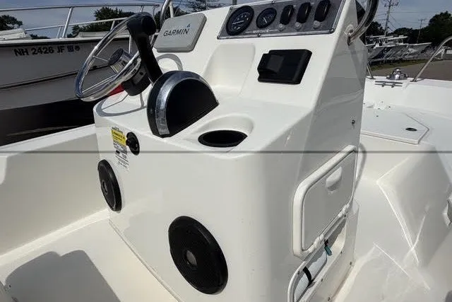 Slide: The Image of 2019 Boston Whaler 150 Montauk boat console with Garmin navigation system. - 12