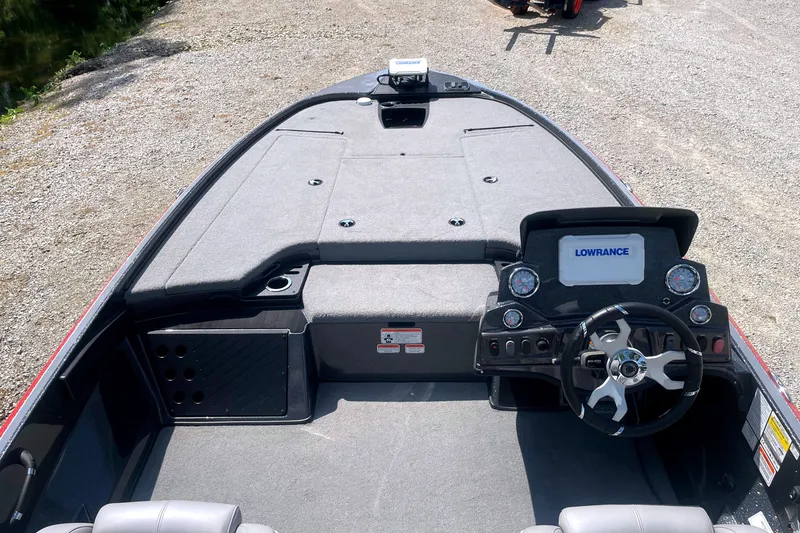 Slide: The Image of 2024 Nitro Z18 boat interior with steering wheel and Lowrance display. - 7