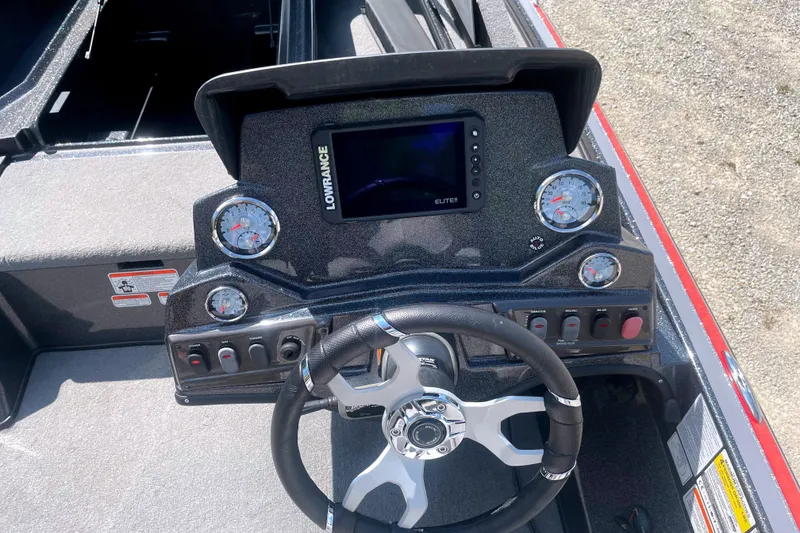 Slide: The Image of 2024 Nitro Z18 boat dashboard with Lowrance Elite display and gauges. - 10