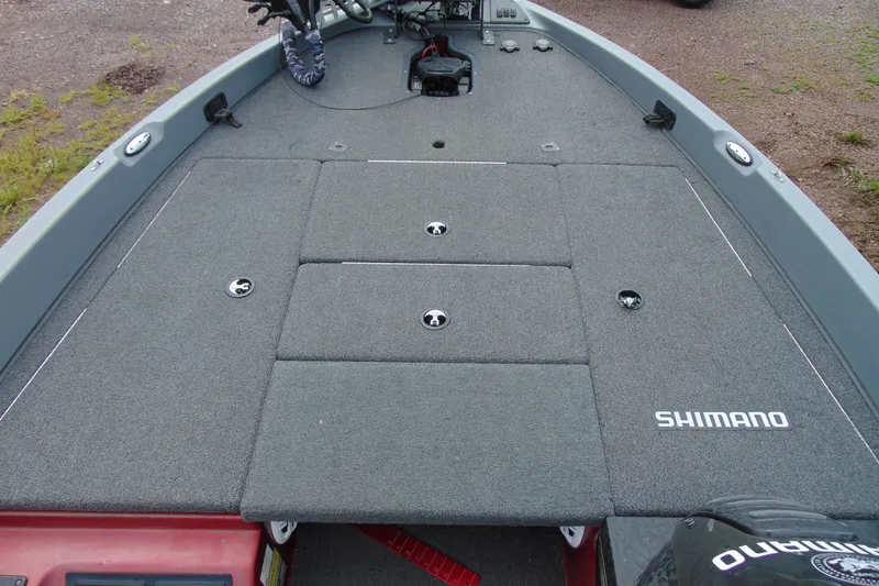 Slide: The Image of Boomeranger 188 boat deck, 2010 model, featuring Shimano branding and carpeted surface. - 14