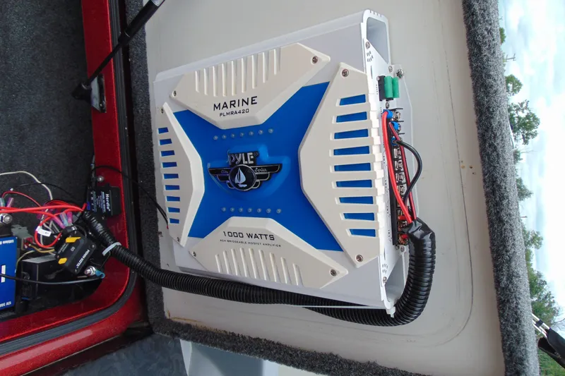 Slide: The Image of Marine amplifier installed in a Boomeranger 188, 2010 model, with visible wiring connections. - 16
