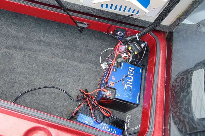 Slide: The Image of Battery compartment of a 2010 Boomeranger 188 with wiring and components. - 17