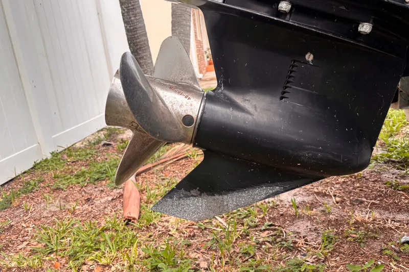 Slide: The Image of Propeller of a 1992 Hydra-Sports 2000 CC boat on grassy ground. - 6
