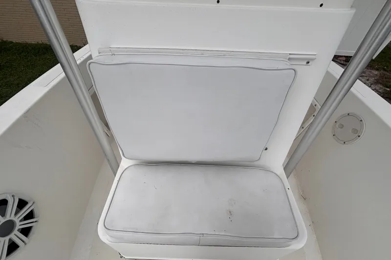 Slide: The Image of 1992 Hydra-Sports 2000 CC boat seat with white cushion and metal frame. - 35