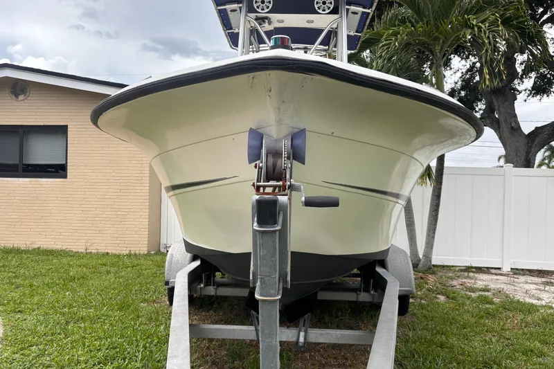 Slide: The Image of 1992 Hydra-Sports 2000 CC boat on trailer, parked beside a house. - 12
