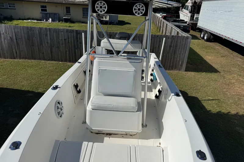 Slide: The Image of 1992 Hydra-Sports 2000 CC boat, white interior, outdoor setting, fenced yard. - 4
