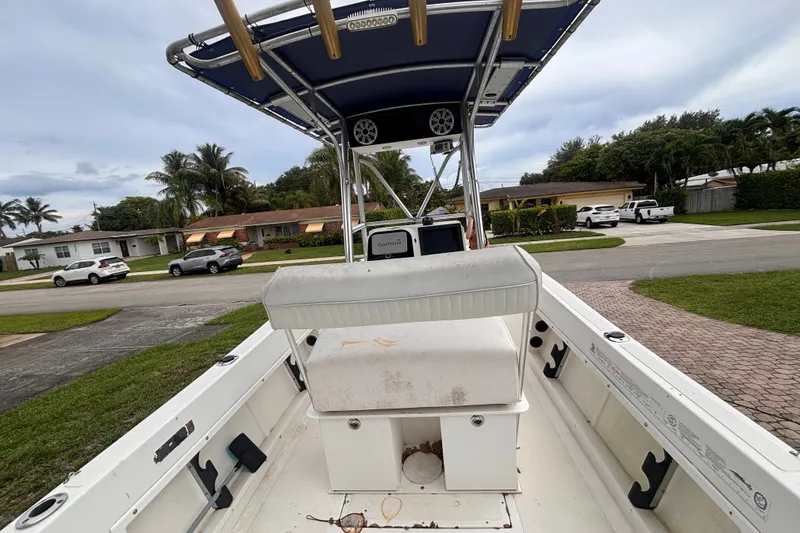 Slide: The Image of 1992 Hydra-Sports 2000 CC boat with T-top, parked in a suburban neighborhood. - 16