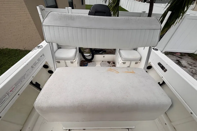 Slide: The Image of 1992 Hydra-Sports 2000 CC boat interior with white seating and storage compartments. - 36