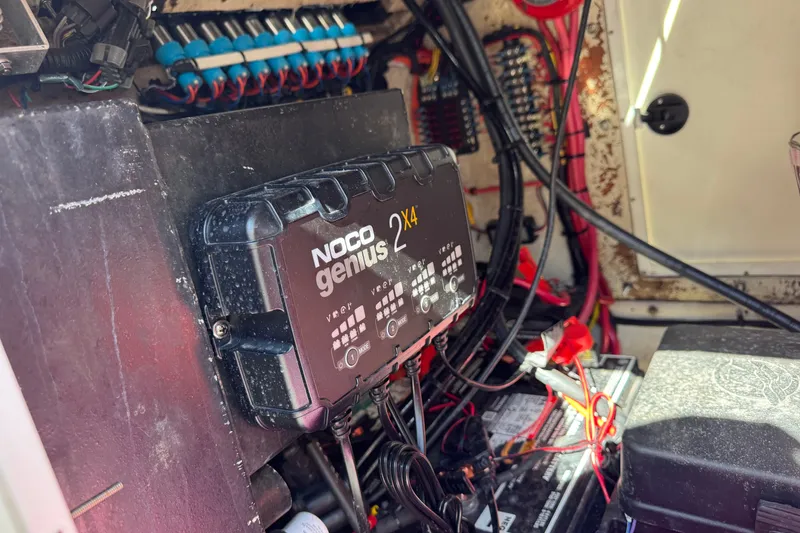 Slide: The Image of NOCO Genius 2X4 charger in 1992 Hydra-Sports 2000 CC boat's electrical system. - 9
