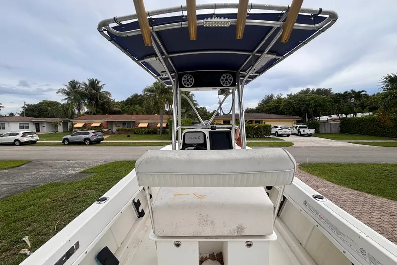 Slide: The Image of 1992 Hydra-Sports 2000 CC boat with T-top, parked in a suburban neighborhood. - 18