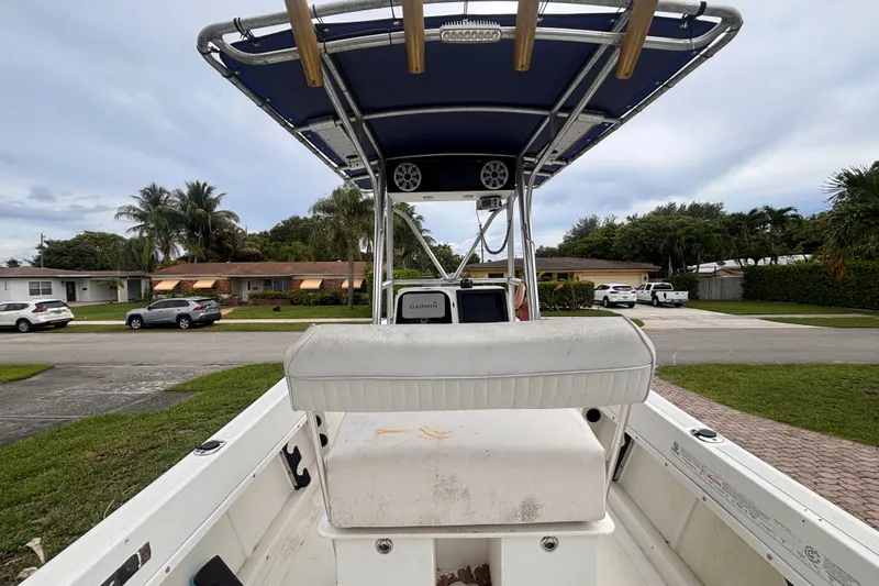 Slide: The Image of 1992 Hydra-Sports 2000 CC boat with T-top, parked in suburban neighborhood. - 17