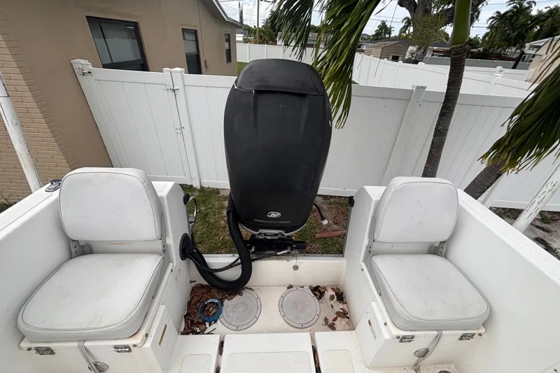 Slide: The Image of 1992 Hydra-Sports 2000 CC boat interior with dual seats and outboard motor. - 37